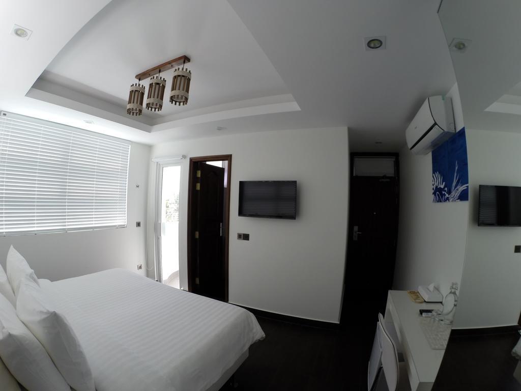 Airport Beach Hotel هولهومالي الغرفة الصورة