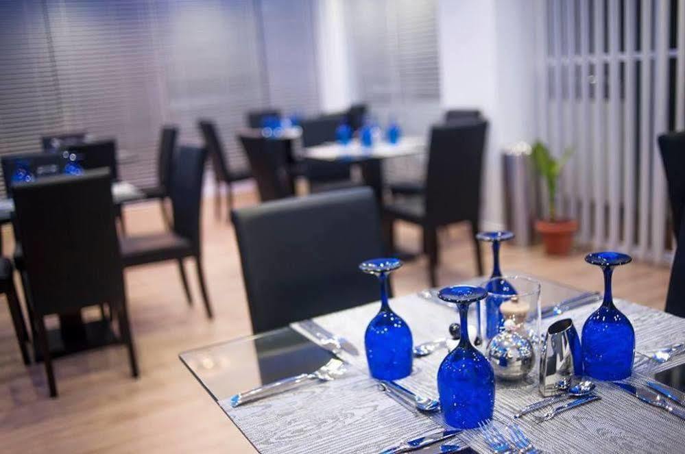 Airport Beach Hotel هولهومالي المظهر الخارجي الصورة
